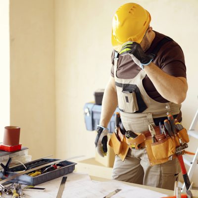 iStock-Builder-toolbelt-ladder